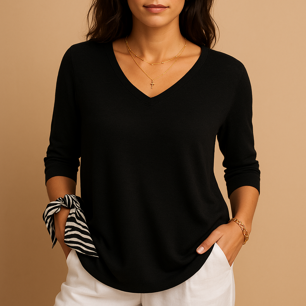 Women’s luxury loose-fit top with a modern elegant silhouette, designed for everyday comfort, casual outings, and relaxed moments.