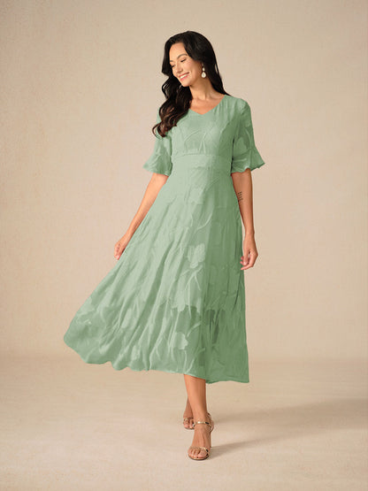Women's Elegant Midi Dress Flutter Sleeves Lace Detailing
