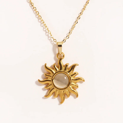 Aurora Spiral Sun Pendant Silver Tone