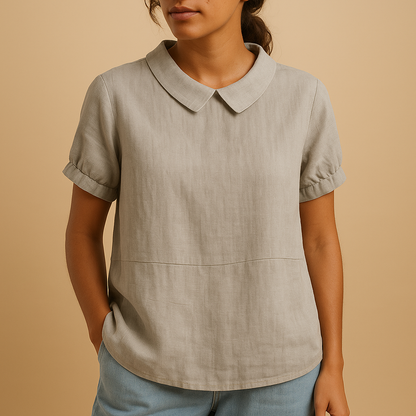 Elegant tailored blouse for women with a classic design, suitable for office outfits, formal occasions, and smart casual wear.