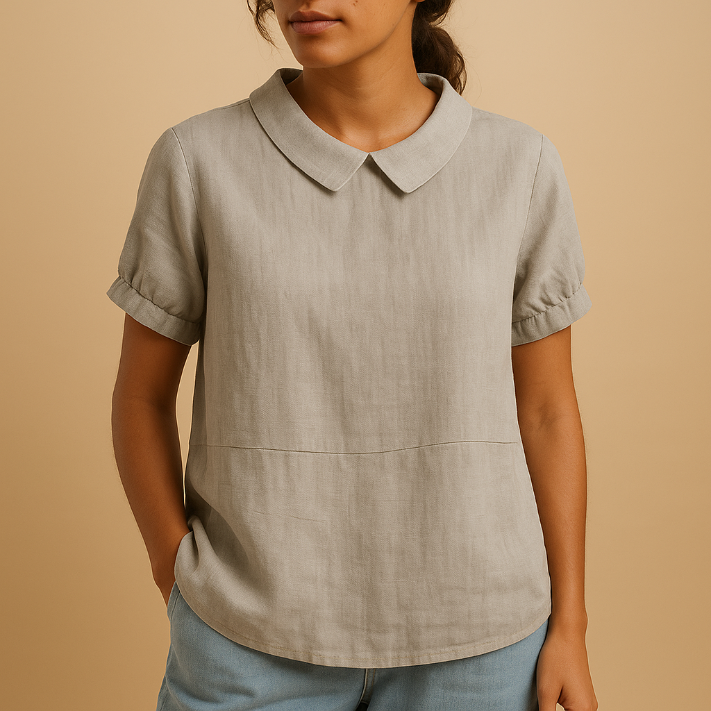 Women’s elegant tailored blouse with a classic design, ideal for office outfits, formal occasions, and smart-casual styling.