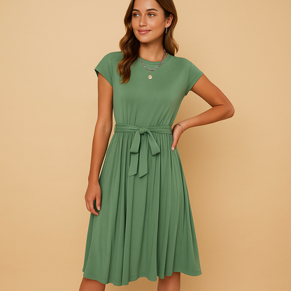 Fitted summer midi or maxi dress for women with tailored waist and breathable fabric, ideal for weddings, vacations, and summer parties.