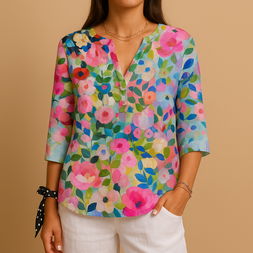 Women’s floral button-up blouse with a classic collar, airy fit and soft floral patterns, ideal for casual, business and summer outfits.