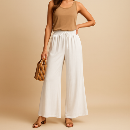 High waist wide leg trousers for women with elastic waistband and elegant silhouette, ideal for work outfits, casual looks, and modern everyday style.