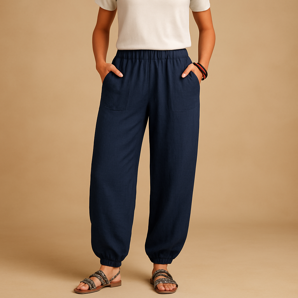 High-waisted boho summer trousers for women with a loose flowing fit and functional pockets, ideal for beach days, travel, and relaxed summer outfits.