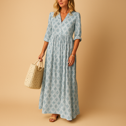 Knee-length summer dress for women with lightweight airy design and feminine fit, perfect for casual brunch, city walks, and stylish summer occasions.