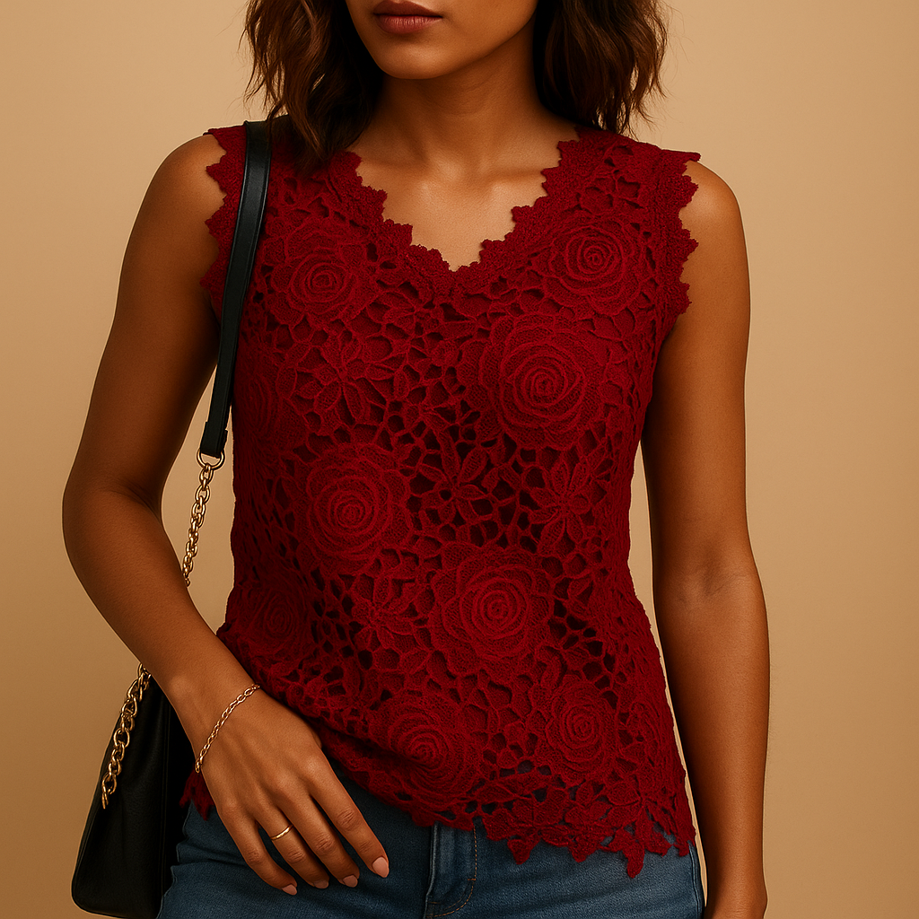 Women’s lace blouse with a round neckline and elegant details, designed for comfortable everyday wear and versatile styling.