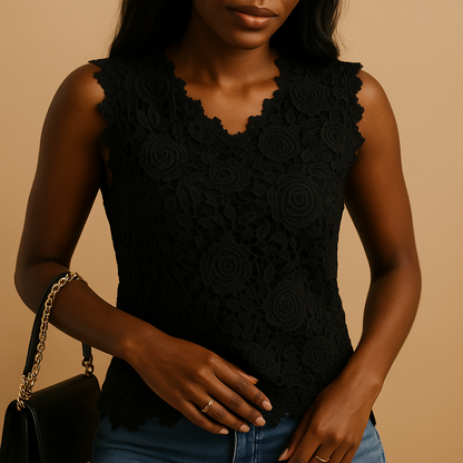 Women’s lace blouse with a round neckline and elegant details, designed for comfortable everyday wear and versatile styling.