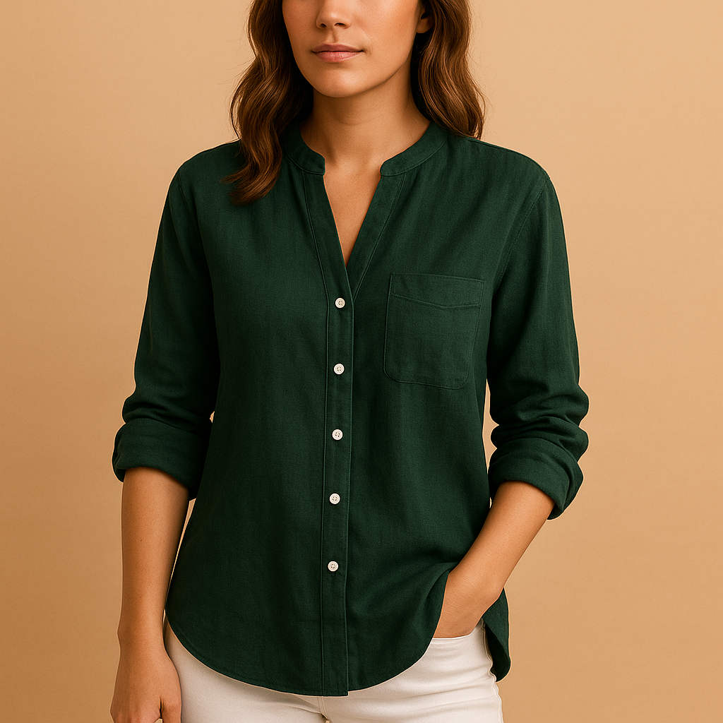 Women’s lightweight long sleeve shirt with tailored fit, breathable fabric, and classic button-down design for casual or formal wear.