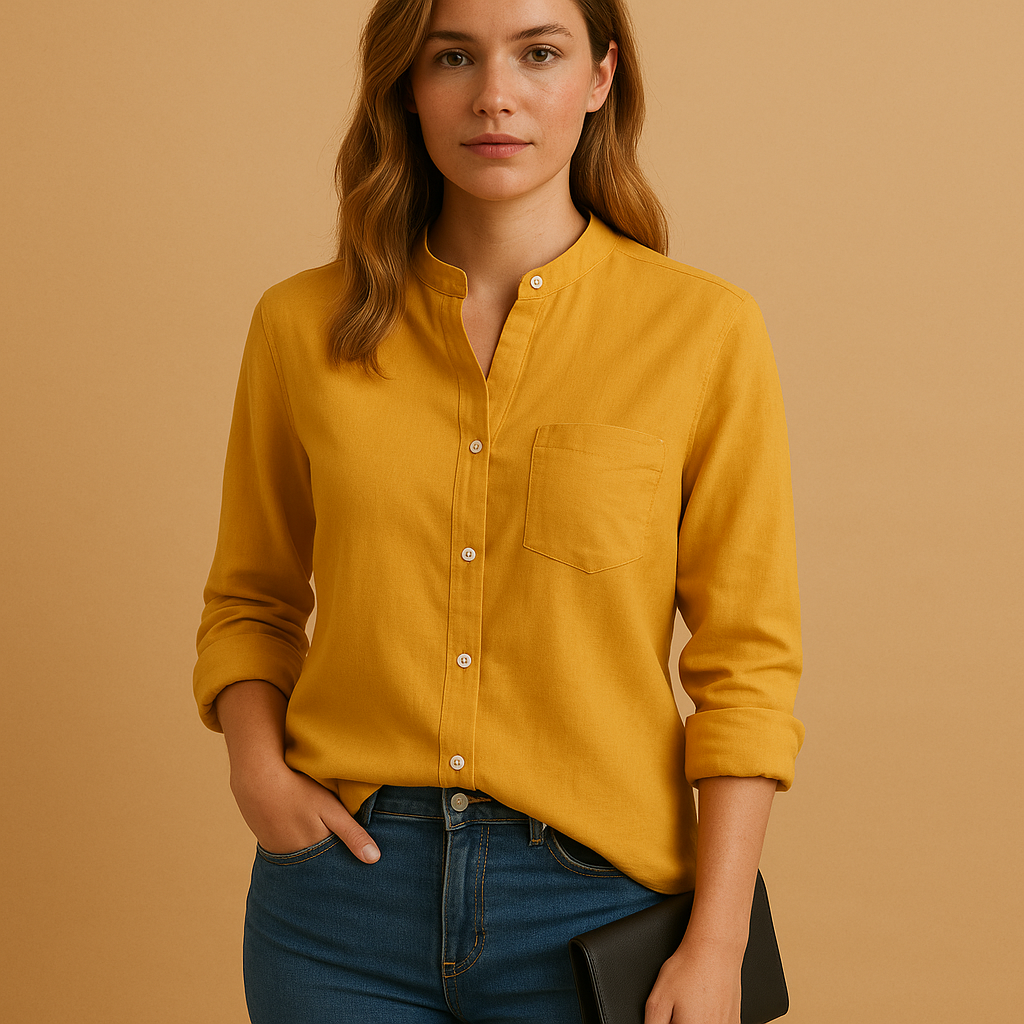 Women’s lightweight long sleeve shirt with tailored fit, breathable fabric, and classic button-down design for casual or formal wear.