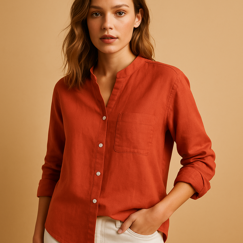 Women’s lightweight long sleeve shirt with tailored fit, breathable fabric, and classic button-down design for casual or formal wear.