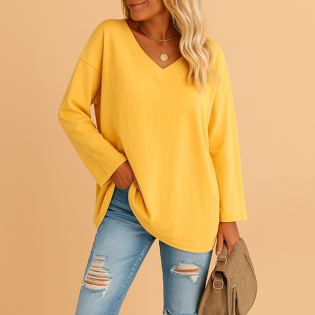 Lightweight summer top for women with a relaxed fit and short sleeves, suitable for casual wear, warm days, and everyday summer outfits.