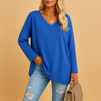 Lightweight summer top for women with a relaxed fit and short sleeves, suitable for casual wear, warm days, and everyday summer outfits.