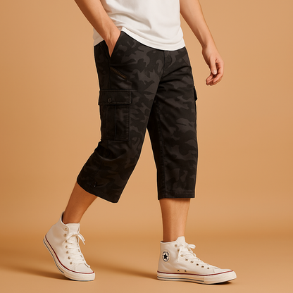 Men’s long cargo shorts with multiple pockets, ideal for outdoor activities, travel, and casual summer outfits.