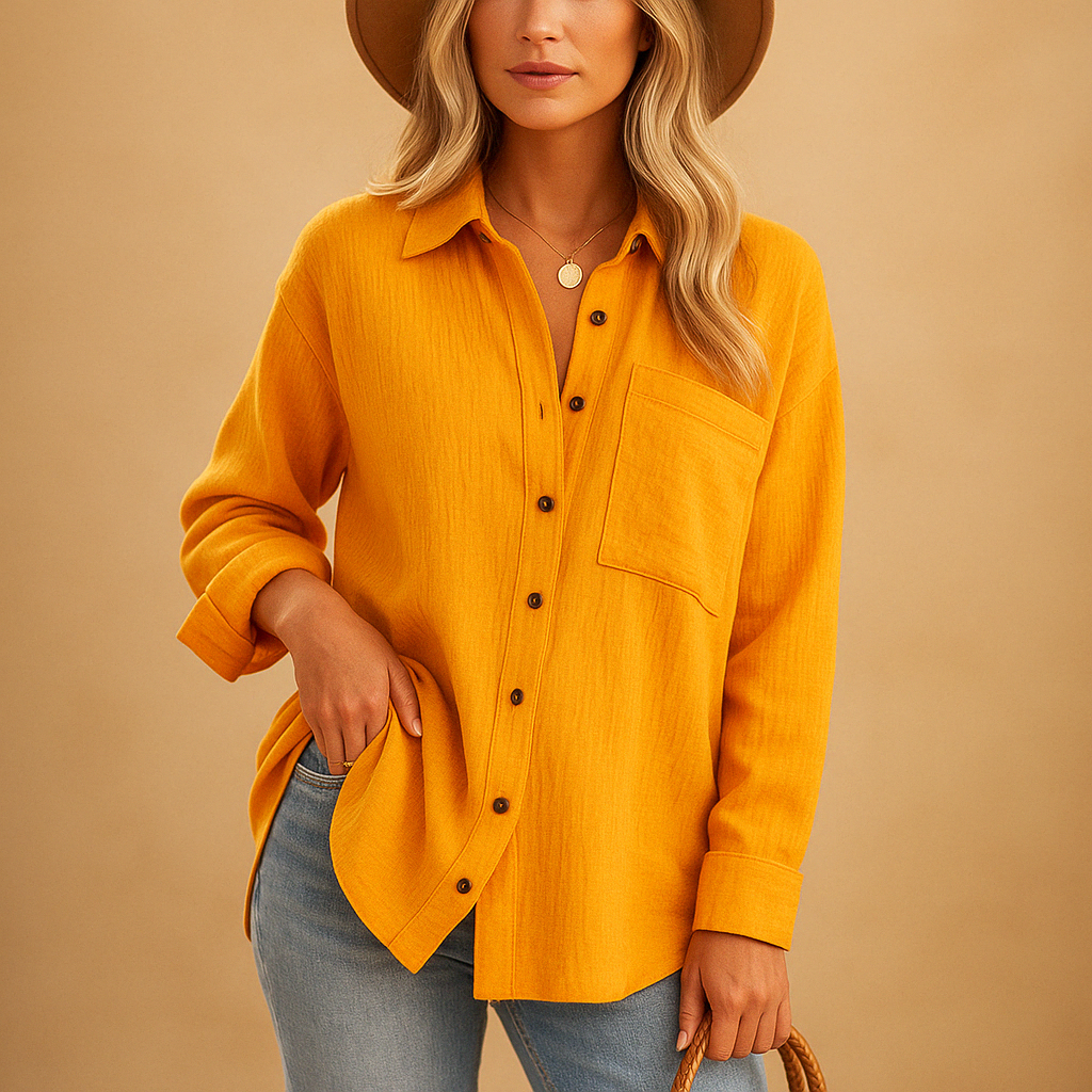 Women’s long sleeve polo shirt with breathable cotton blend, classic collar, and comfortable loose fit for everyday wear.