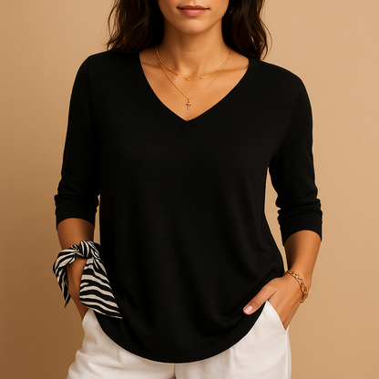 Women’s loose-fit luxury top with soft high-quality fabric and an elegant modern silhouette, ideal for casual and everyday wear.