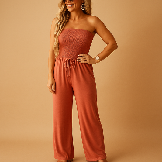 Woman wearing an orange off-shoulder summer jumpsuit with a light, comfortable fit, perfect for casual outings and warm summer days.