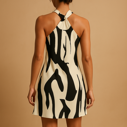 Sleeveless printed summer dress for women with a relaxed flattering fit, ideal for beach days, vacations, and casual summer outings.