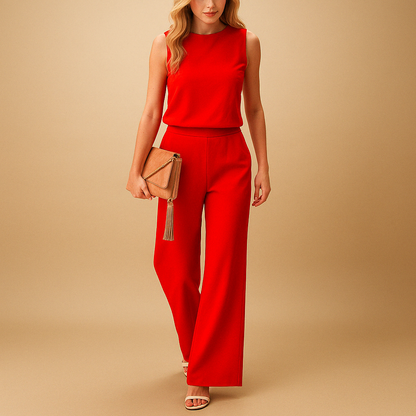 Wide leg elegant jumpsuit for women with round neckline and flattering mid-waist fit, perfect for work, formal occasions, or evenings out.